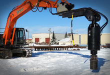 Excavator with a large Digga Piling drive.